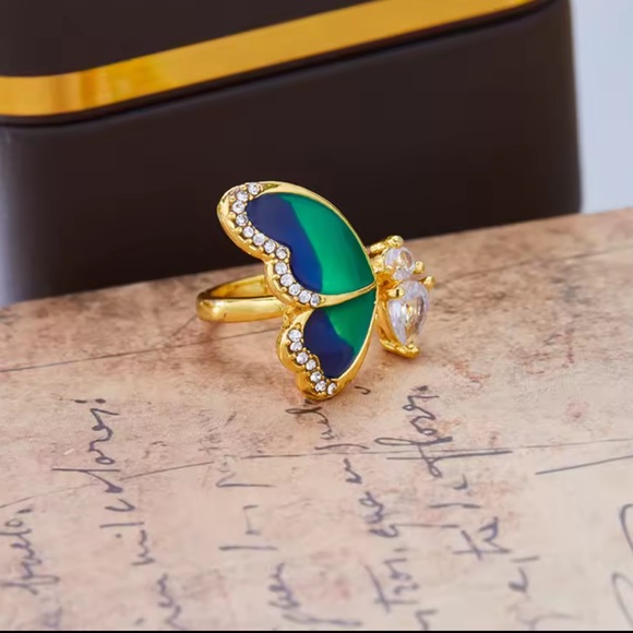 Anthropologie Gold Ring with Blue and White Butterfly Design - Picture 6 of 7